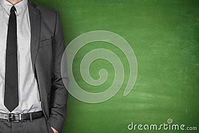 Businessman front of Blackboard Stock Photo