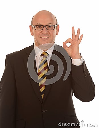 Businessman gesturing OK Stock Photo