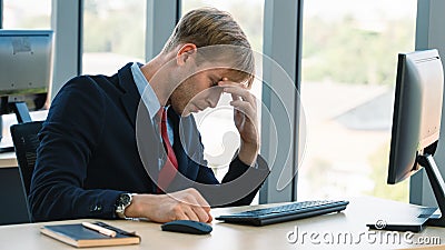 Businessman geting stress and serious at work in office Stock Photo