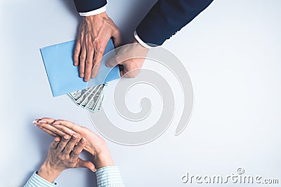 Businessman gives bribe to woman partne Stock Photo