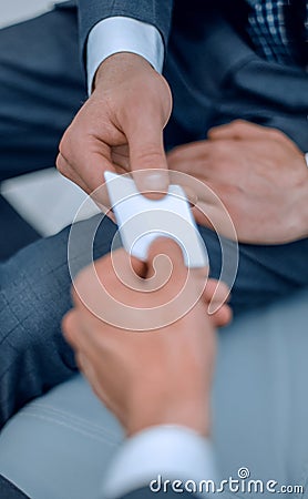 Businessman gives business card. Business theme. Stock Photo