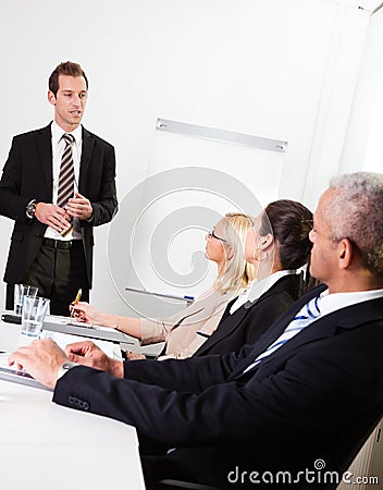 Businessman giving a presentation Stock Photo