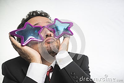 Businessman with glasses stars, crazy and funny achiever Stock Photo