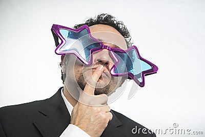 Businessman with glasses stars, crazy and funny achiever Stock Photo