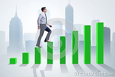 The businessman going up the bar chart in growth concept Stock Photo