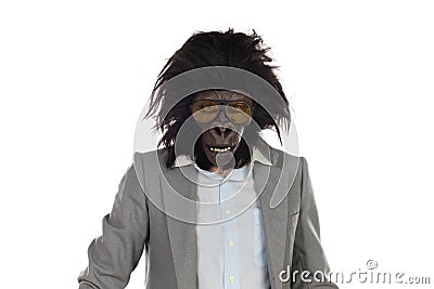 Businessman with gorilla head gesturing Stock Photo