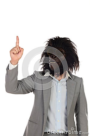 Businessman with gorilla head gesturing Stock Photo