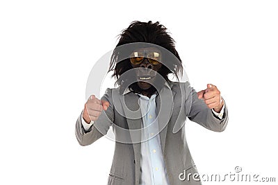 Businessman with gorilla head gesturing Stock Photo