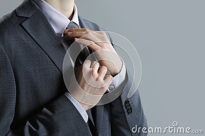 A businessman in a grey suit Stock Photo