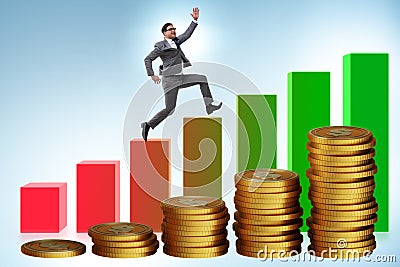 Businessman in the growth concept with coins chart Stock Photo