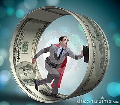 Businessman in hamster wheel chasing dollars Stock Photo