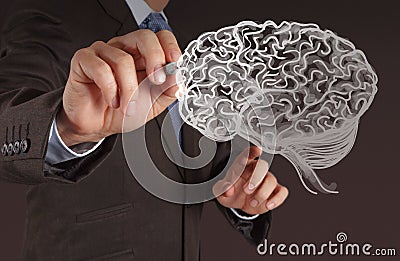 Businessman hand drawing a brain Stock Photo