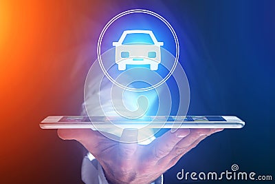 Businessman hand holding mobile phone with car icon Stock Photo