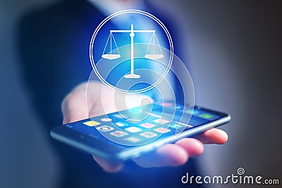 Businessman hand holding mobile phone with justice icon Stock Photo