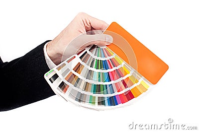 Hand holding a pantone palette Stock Photo