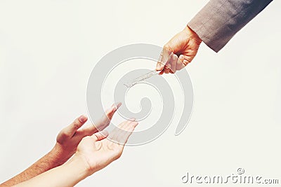 Businessman hand holding US dollar, USD. bills, offers dollar bank note money and giving money Paid for Something by Cash in Busin Stock Photo