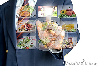 Businessman hand making selection of food menu with digital touch screen Stock Photo