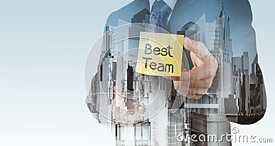 Businessman hand show best team words Stock Photo