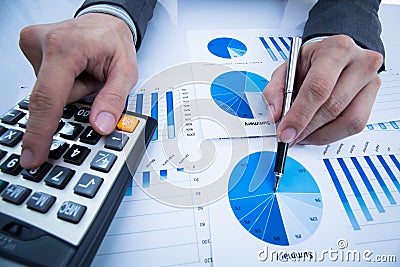 Businessman hand showing growing chart Stock Photo