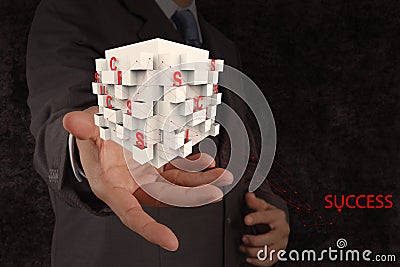 Businessman hand shows box of business success chart Stock Photo