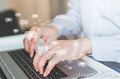 Businessman hand typing on laptop keyboard Stock Photo