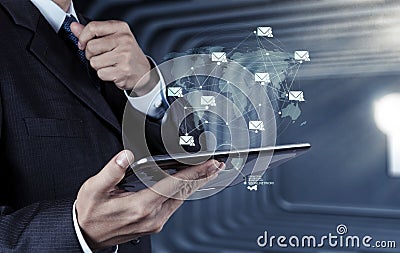 Businessman hand use smart phone computer with email icon as con Stock Photo