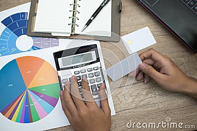 Businessman hand working with finances Stock Photo