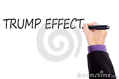 Businessman hand writes Trump Effect Editorial Stock Photo