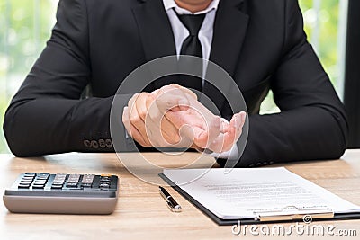 Businessman hands pain on desk office syndrome concept. Stock Photo