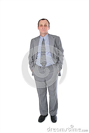 BusinessMan hands in pockets Stock Photo