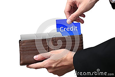 Businessman hands pulling red folder CREDIT concept on brown wal Stock Photo