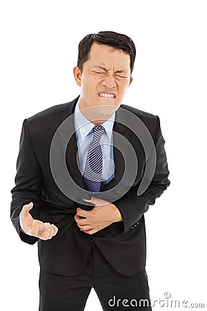 Businessman have stomach pain isolated on a white Stock Photo