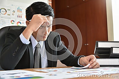 Businessman having headache. Stock Photo