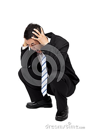 Businessman Headache and Squatted Stock Photo