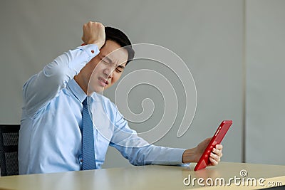 Businessman headache during video call in office at work Stock Photo