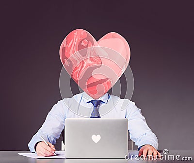 Businessman with heart instead of his head Stock Photo