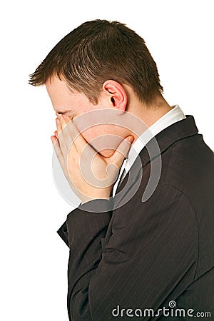 Businessman hiding his face in shame Stock Photo