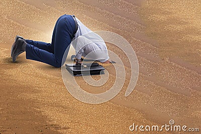 The businessman hiding his head in sand escaping from problems Stock Photo