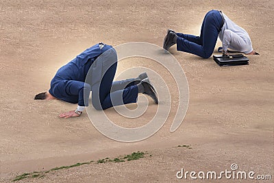 The businessman hiding his head in sand escaping from problems Stock Photo