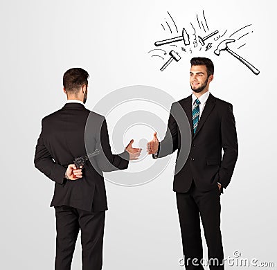 Businessman hiding a weapon Stock Photo