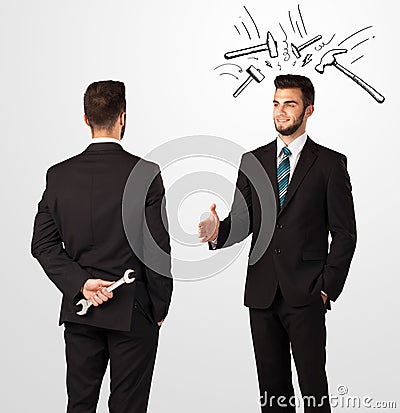 Businessman hiding a weapon Stock Photo