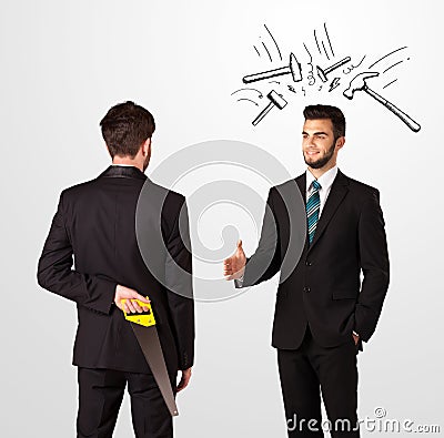 Businessman hiding a weapon Stock Photo