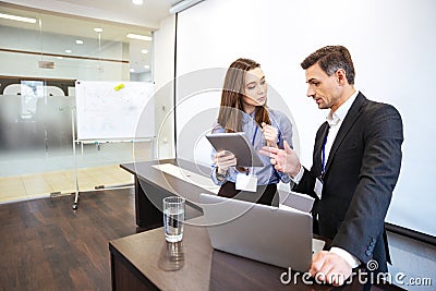 Businessman and his secretary planning work in office Stock Photo