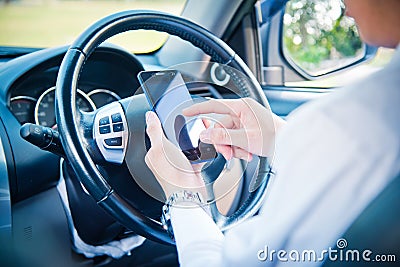 Businessman and hold phone in car Stock Photo