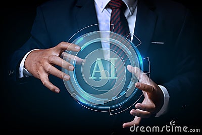 Businessman holding on the AI(Artificial Intelligence) wording with the circle digital hi-tech technology circuit design Stock Photo