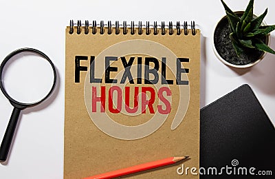 businessman holding a card with text FLEXIBLE HOURS Stock Photo