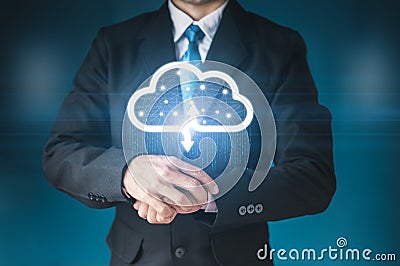 Businessman holding a cloud data icon with light and the binary number 1010. The concept of digital traffic is connected to the cl Stock Photo