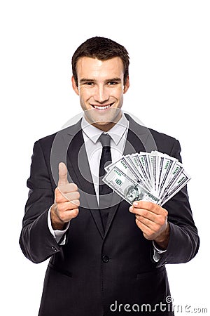 Businessman holding dollar bills Stock Photo