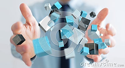 Businessman holding floating blue shiny cube network 3D rendering Stock Photo