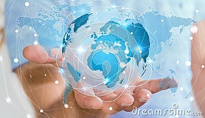 Businessman holding global network on planet earth 3D rendering Stock Photo